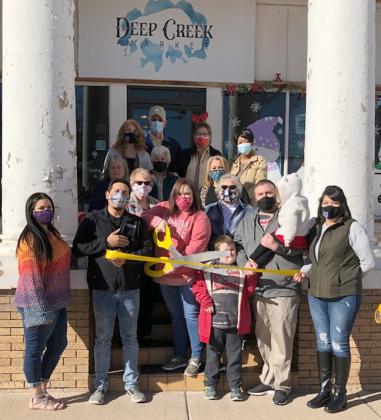 Deep Creek Market, a clothing store located at 2501 College Ave., celebrated its grand opening with a Snyder Chamber of Commerce ribbon cutting. Pictured on the front row are (l-r) Summer Grimmett, Josh Ortegon, Cindy Carey, Renee Eaves, Sandy Kinman, Ian Eaves, Jeremy Eaves, Isla Eaves and Sandra Salinas. On the middle row are Susan Griffith, Delores Hartman and Kendra Dunham. On the back row are Linda Molina, Charles Ragland, Carmen Timora and C’Ella Clayton.