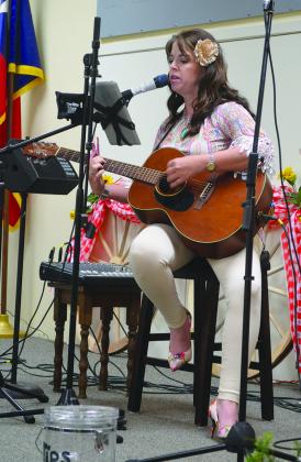 Musician Cathy Whitten performed country songs and hymns during the 40th annual volunteer recognition banquet at the Scurry County Senior Citizens Center Friday night.