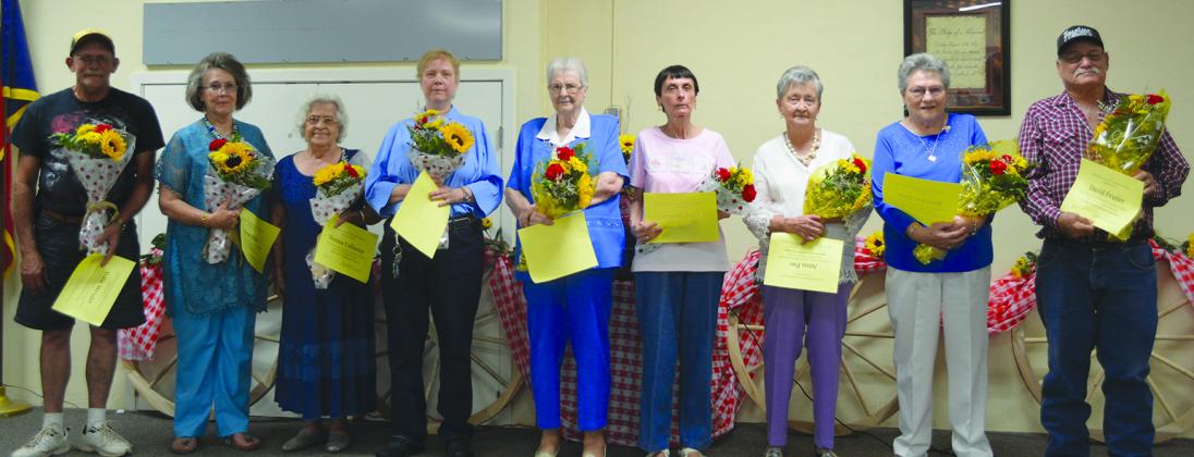 Pictured are Scurry County Senior Citizen Center 2017-18 top volunteers (l-r) Toby Wright, 357.5 hours; Susan Bills, 375.5 hours; Norma Callaway, 422 hours; Melissa Warren, 492.5 hours; Veida Gage, 503 hours; Chris Brown, 516 hours; Anna Poe, 985.5 hours; Rosa Lee Crow, 1,050.5 hours; and David Frazier, 1,190 hours. Not Pictured are Pauline Walton, 400 hours; Ruth Morrell, 394 hours; Dorothy Lankford, 362 hours; Tracy McBeth, 334.5 hours; Gayle Wittie, 333 hours; and James Wolf, 300 hours.