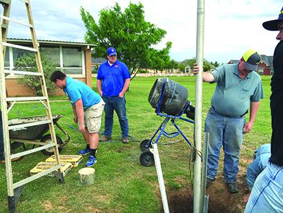 Armando Gonzalez (left) renovated Grace Lutheran Church as his Eagle Scout project while Lone Star District Executive Director Zackary Mullins and Scoutmaster James Bond checked out his work.