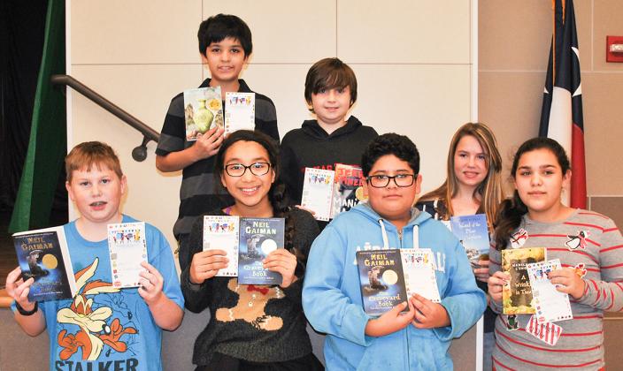 Students in Annie Stanger’s English classes at Snyder Junior High School participated in a reading contest. Pictured on the front row are (l-r) Kaden Stone, Azariah Sosa, Carlos Chavez (top reader) and Larrisa Wilkinson. On the back row are John Lorenzo, Shaun Harp (top reader), and Emily Carper. 